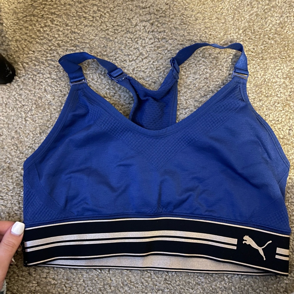 puma sports bra, dark blue with gold and black trim!